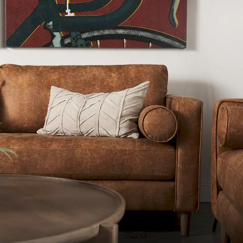 Dreisitzer-Sofa aus cognacbraunem Kunstleder mit Nackenrollen
